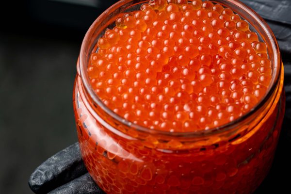 delicious red caviar in a glass jar